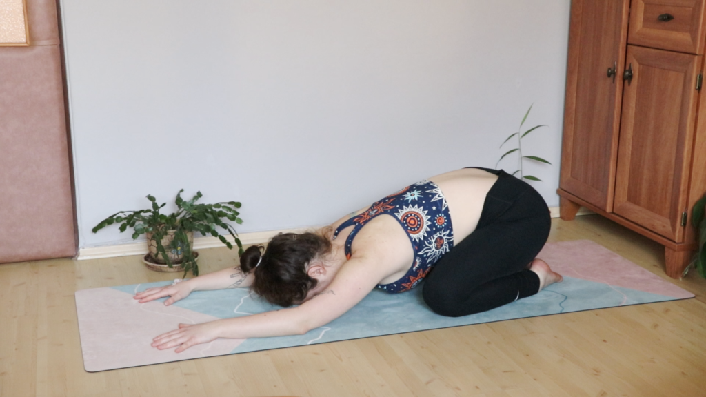 yogini in child's pose